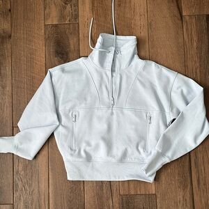 Women's light blue quarter zip active sweatshirt